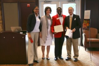 Carolina Robinson, Vicki McMaken, International Agriculture Certificate recipient Paul Adeyemi, and Dr. Ed Kanemasu.
